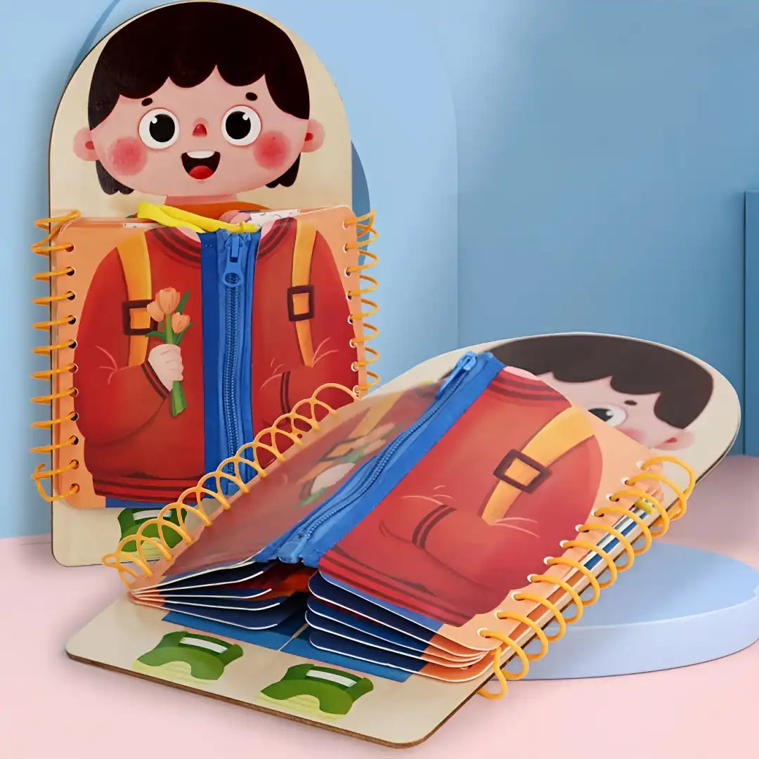 Montessori-inspired BusyTots book with zip and interactive pages – standing and opened view, perfect for developing fine motor skills through real-life dressing tasks