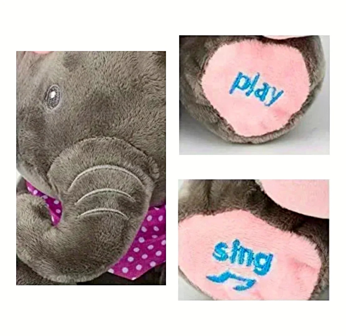 Close-up of the interactive Cuddlephant toy showing embroidered “sing” and “play” buttons on its pink feet and its soft grey trunk with a purple polka-dot scarf – designed for sensory and musical engagement.