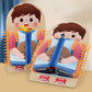Montessori-style fine motor skill book with zipper and lace practice, designed like a friendly child figure – perfect for building independence and coordination.