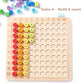 Build & Learn multiplication activity with wooden grid and colourful number tiles for visual and tactile maths learning.